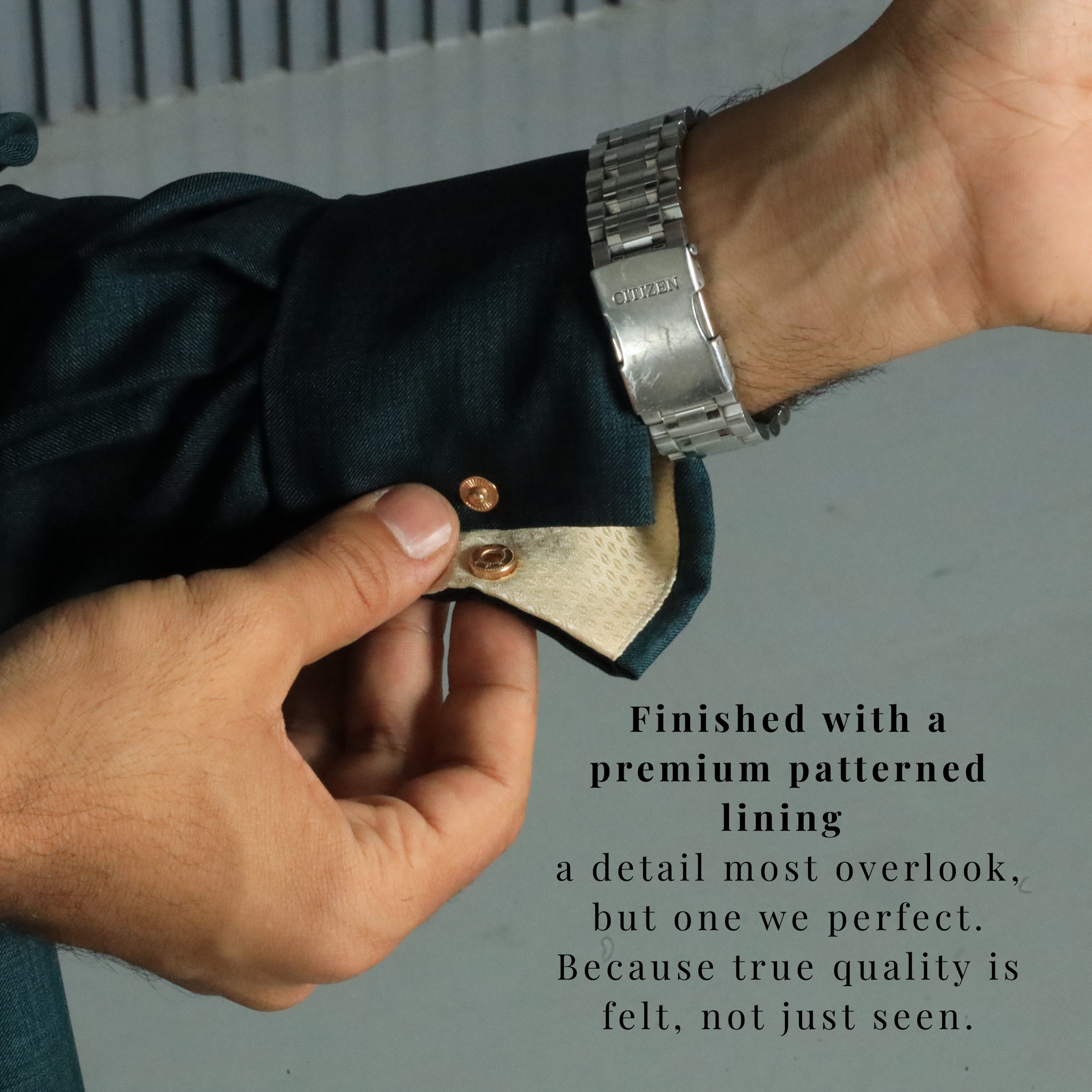 green thobe sleeve detail showing patterned lining and gold button